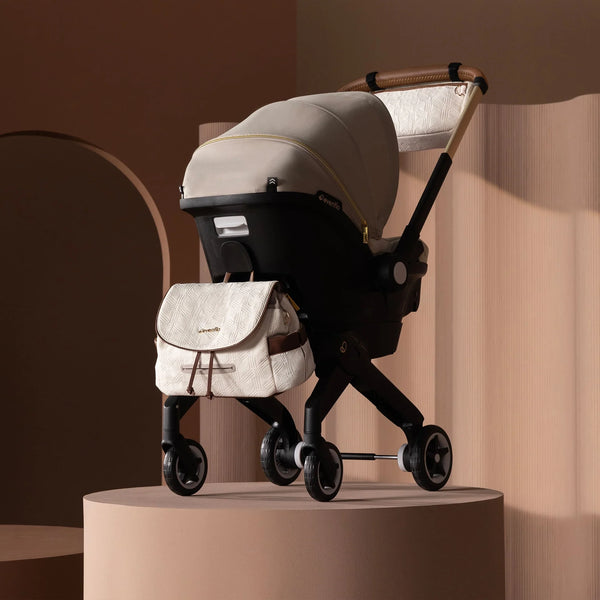 Evenflo® Shyft™ DualRide™ Infant Car Seat - Stroller Combo with Carryall Storage Champagne