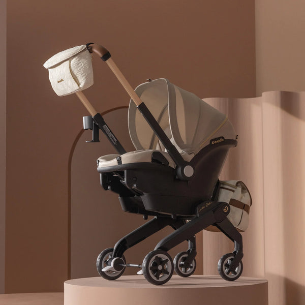 Evenflo® Shyft™ DualRide™ Infant Car Seat - Stroller Combo with Carryall Storage Champagne
